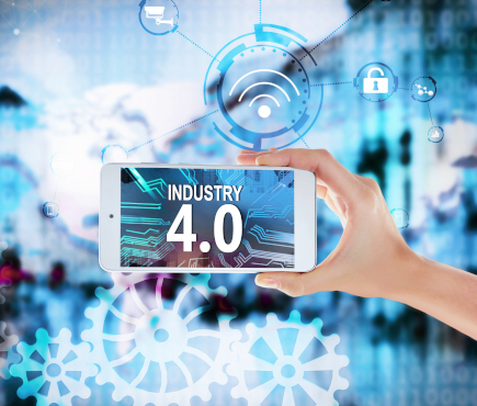 Female hand with smartphone on cityscape background. Text INDUSTRY 4.0 on screen